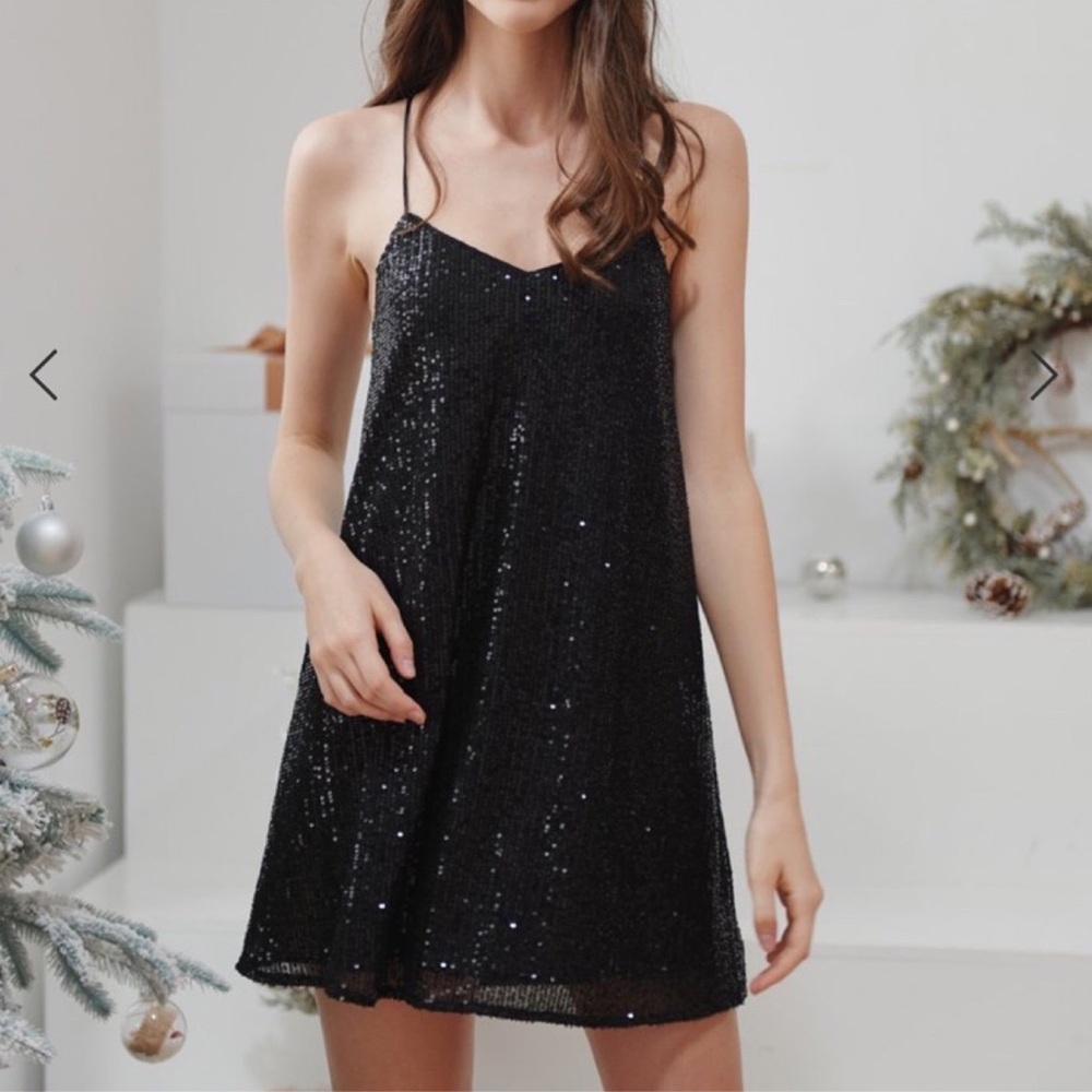 Swing, slip black sequin dress with crossing back